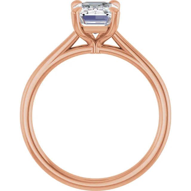 Four Claw Emerald Solitaire Engagement Ring