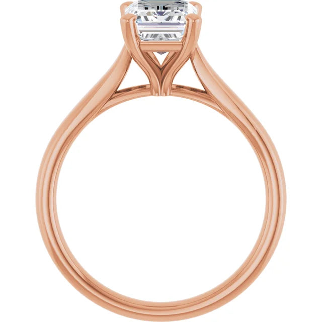 Four Claw Emerald Solitaire Engagement Ring