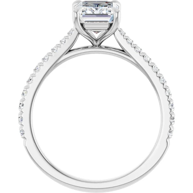 Emerald Claw Set Style Engagement Ring
