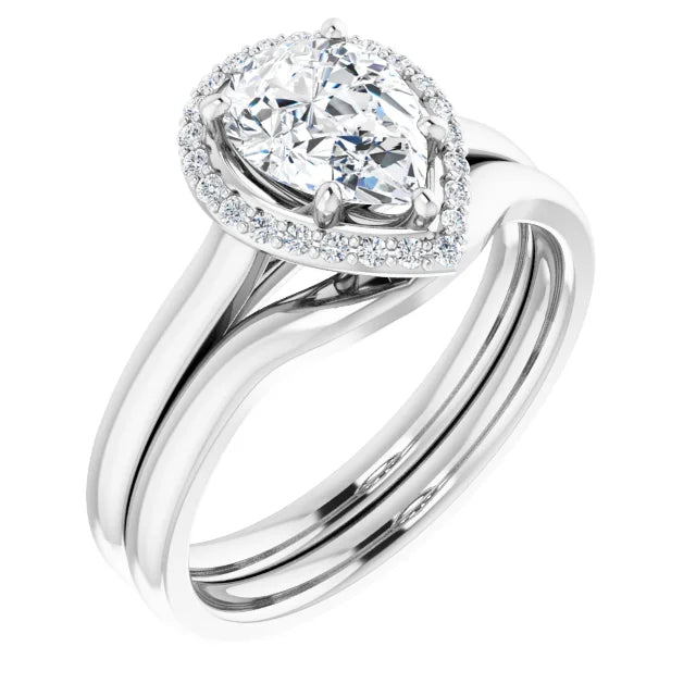 White Gold Pear Halo Solitaire Engagement Ring. Moissanite