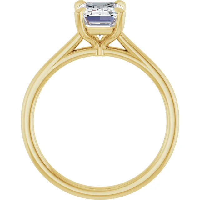 Four Claw Emerald Solitaire Engagement Ring