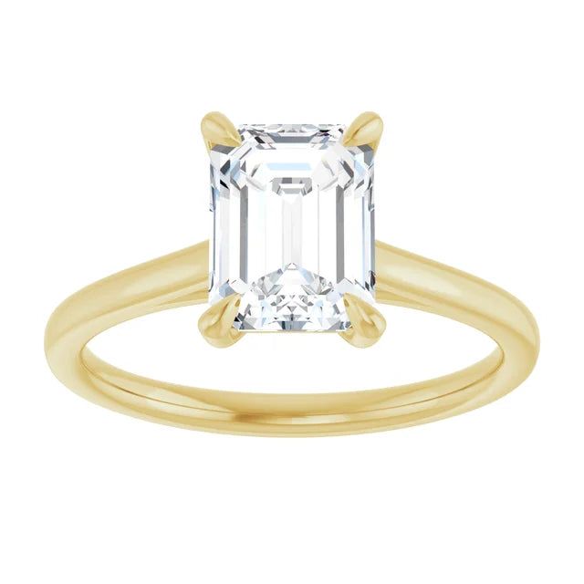Four Claw Emerald Solitaire Engagement Ring