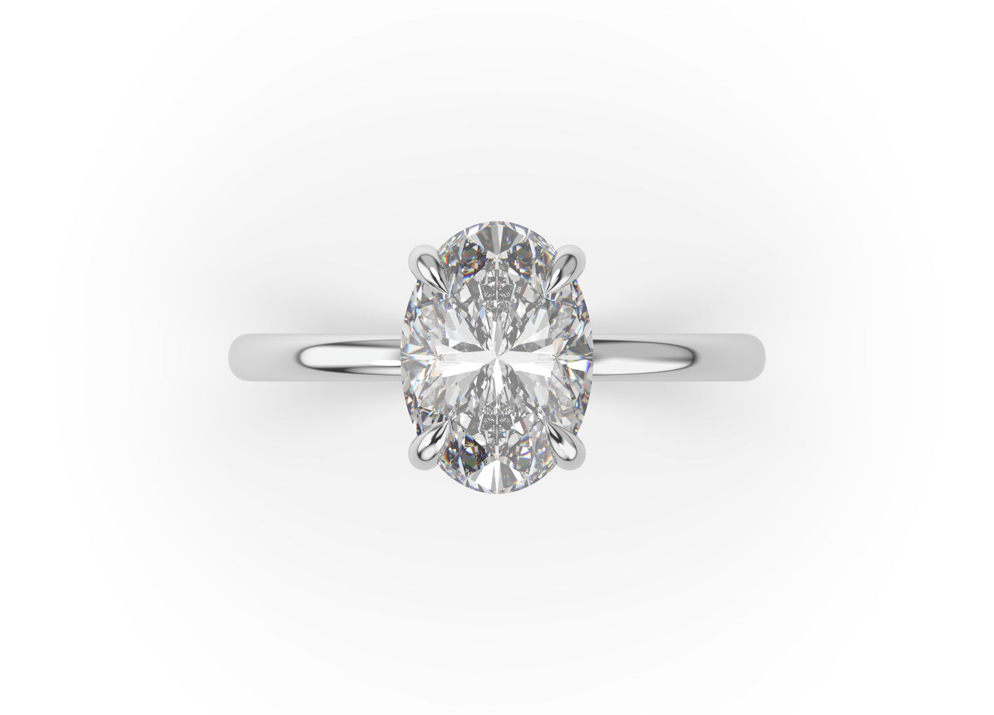 Oval White Gold Four Claw Solitaire Moissanite Engagement Ring