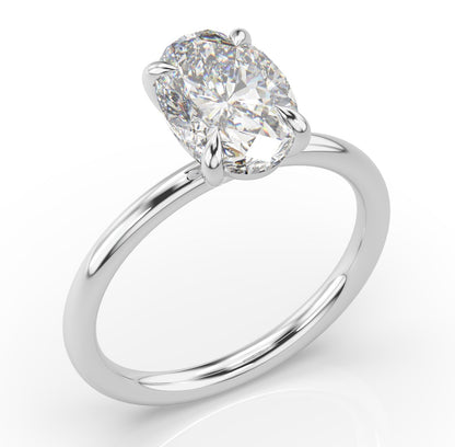 Oval White Gold Four Claw Solitaire Moissanite Engagement Ring