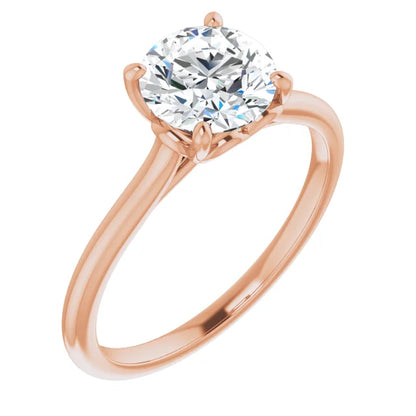 Four Claw Round Brilliant Solitaire Engagement Ring