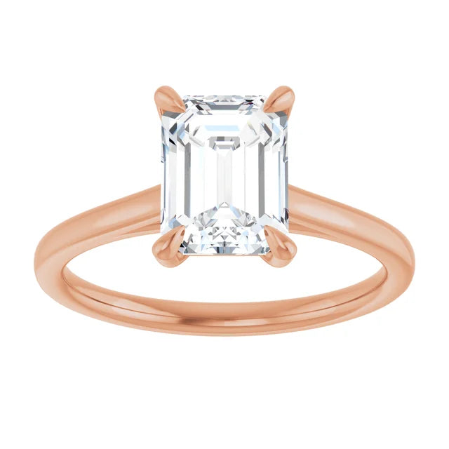 Four Claw Emerald Solitaire Engagement Ring