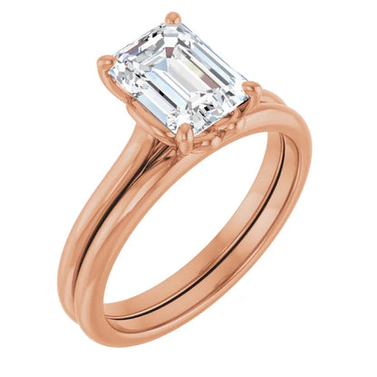 Four Claw Emerald Solitaire Engagement Ring