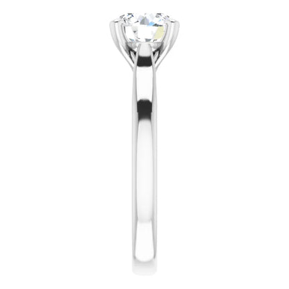 Four Claw Round Brilliant Solitaire Engagement Ring