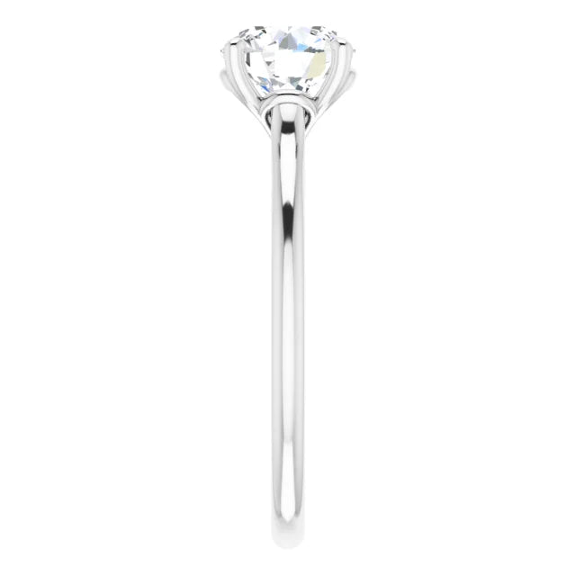 Four Claw Round Brilliant Solitaire Engagement Ring