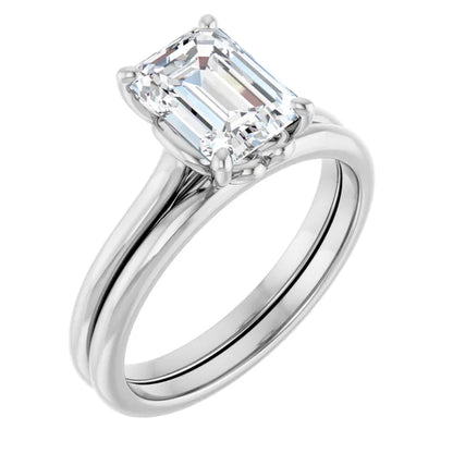 Four Claw Emerald Solitaire Engagement Ring