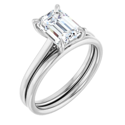 Four Claw Emerald Solitaire Engagement Ring
