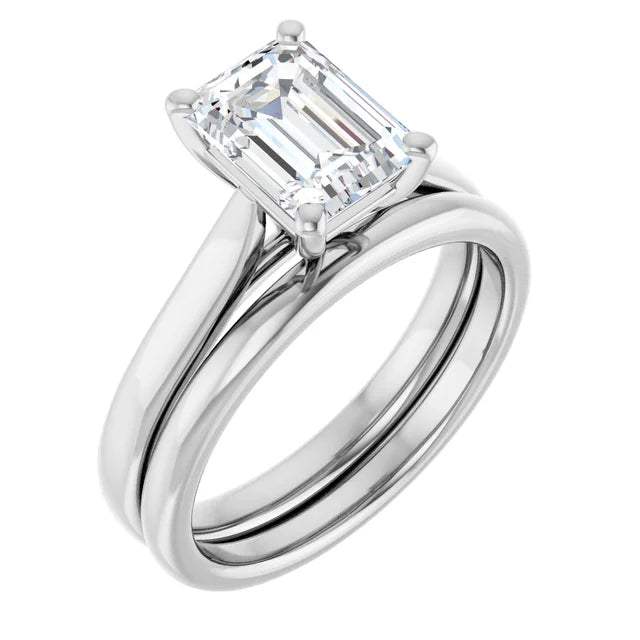 Four Claw Emerald Solitaire Engagement Ring
