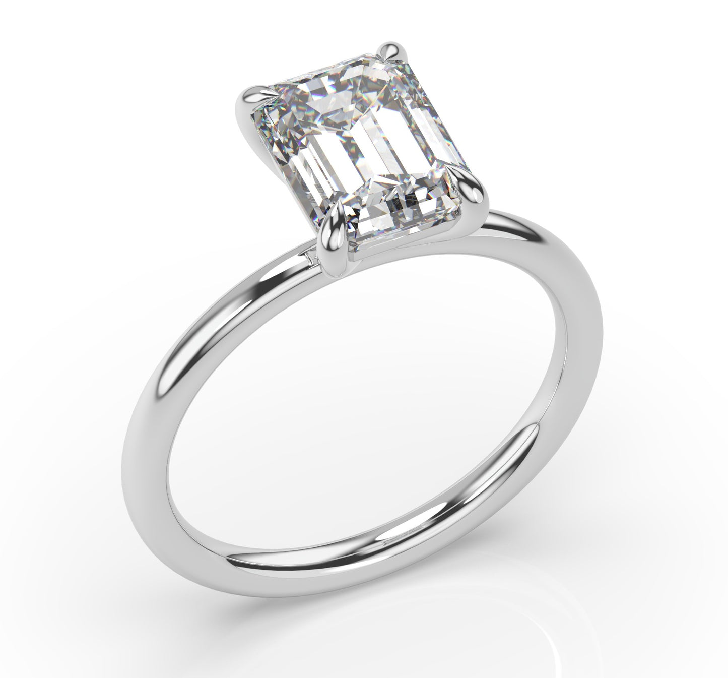 Four Claw Emerald Solitaire Engagement Ring