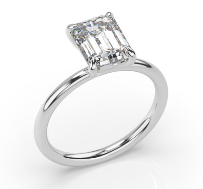 Four Claw Emerald Solitaire Engagement Ring