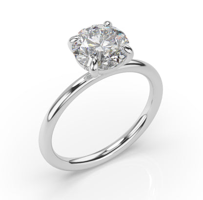 Four Claw Round Brilliant Solitaire Engagement Ring