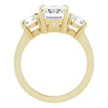 Emerald Accent Engagement Ring